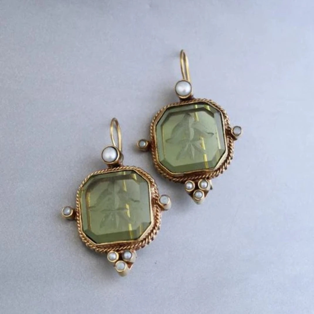 Vintage-style earrings with green crystals