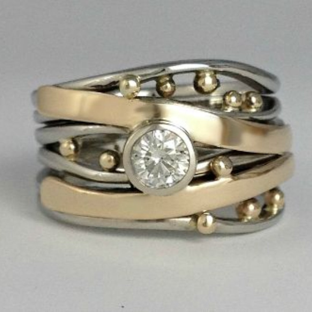 Ring with Zirconia in Gold and Silver