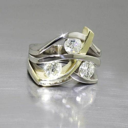Vintage ring with cubic zirconia in gold and antique silver