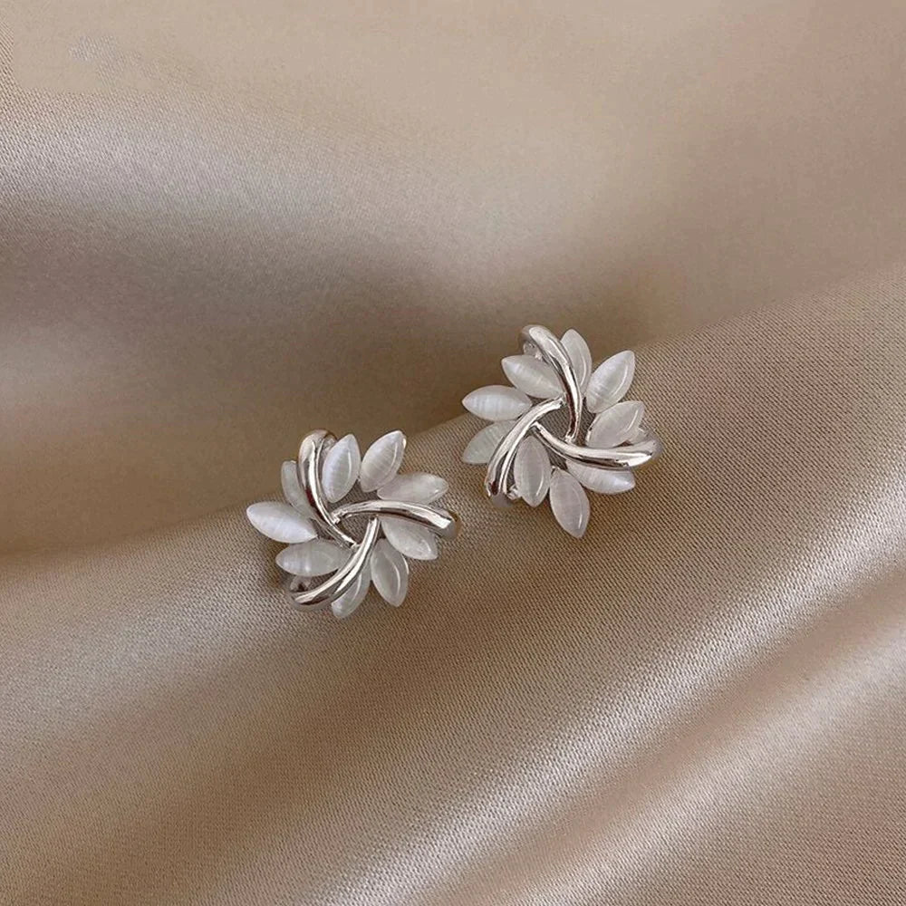 Elegant gold and silver nut earrings