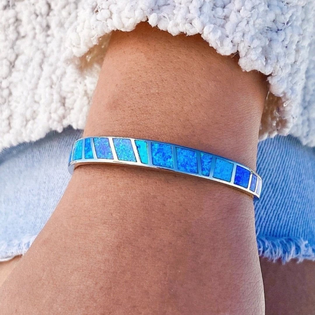 Blue and silver bracelet with opal