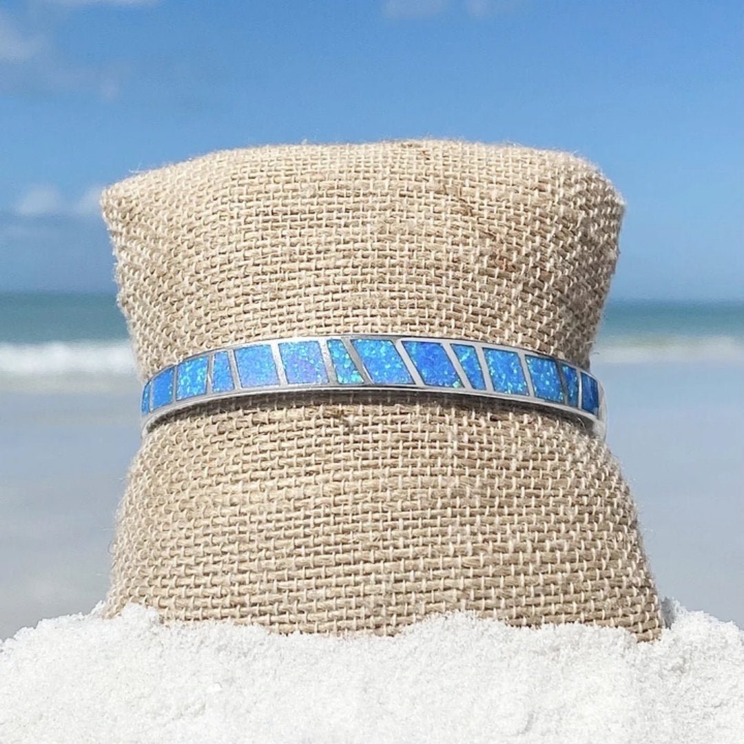 Blue and silver bracelet with opal