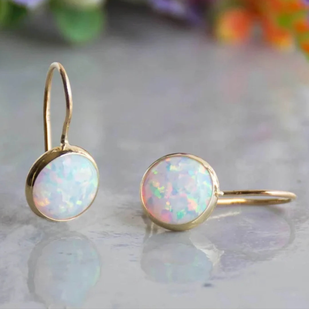 Vintage-style gold-plated earrings with white opal