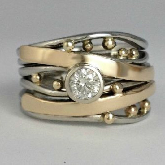 Ring with Zirconia in Gold and Silver