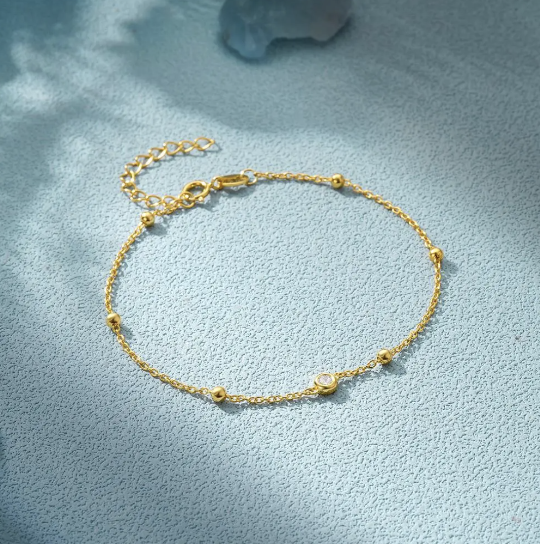 Eye Bracelet with Zirconia Pearls in 18K Gold Plating