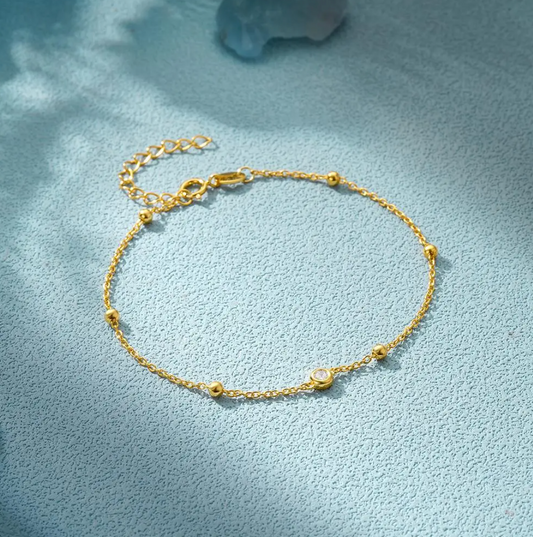Eye Bracelet with Zirconia Pearls in 18K Gold Plating