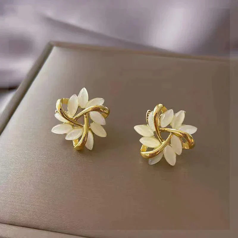 Elegant gold and silver nut earrings
