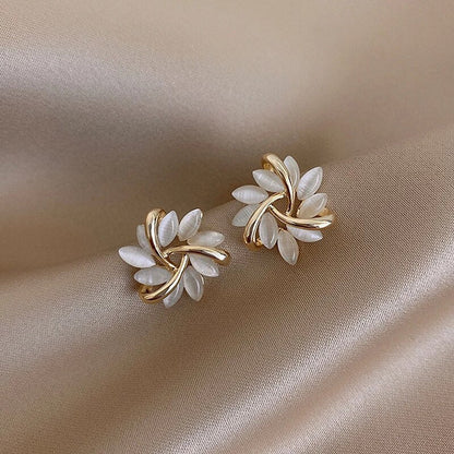 Elegant gold and silver nut earrings