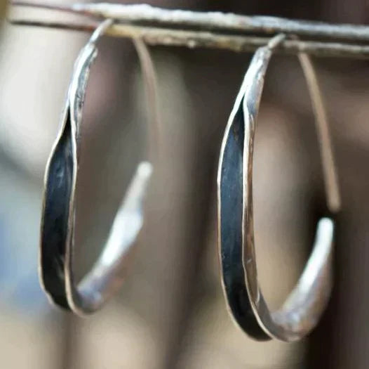 Single large hoop earrings