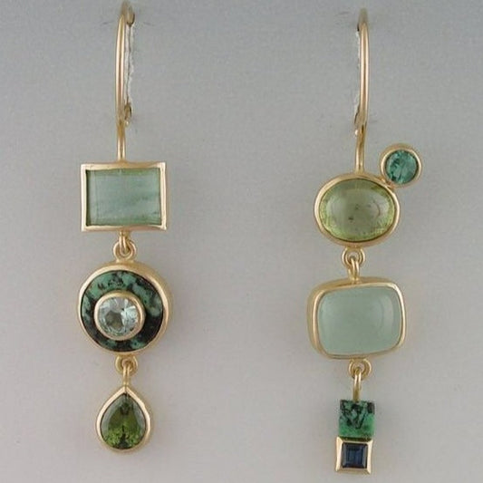 Green hanging earrings in vintage style