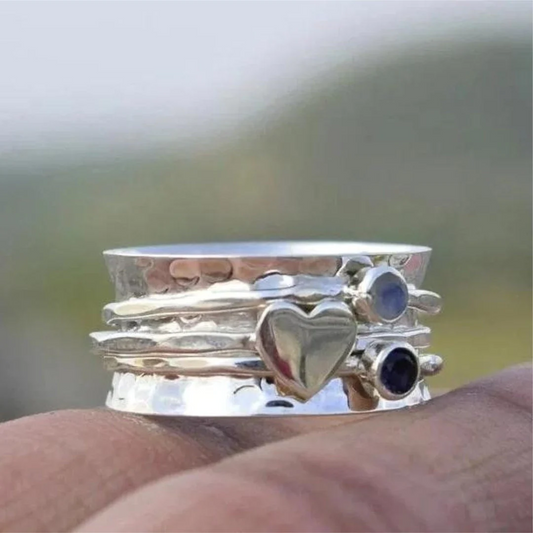 Elegant Rotating Heart Ring in Silver
