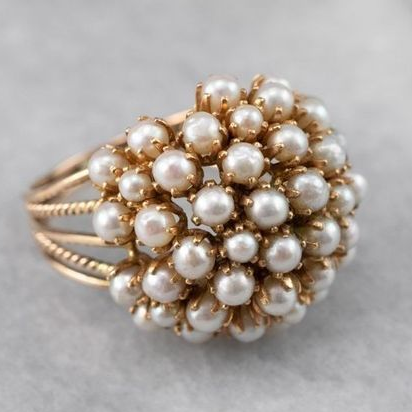 Vintage-style ring with pearl inlay