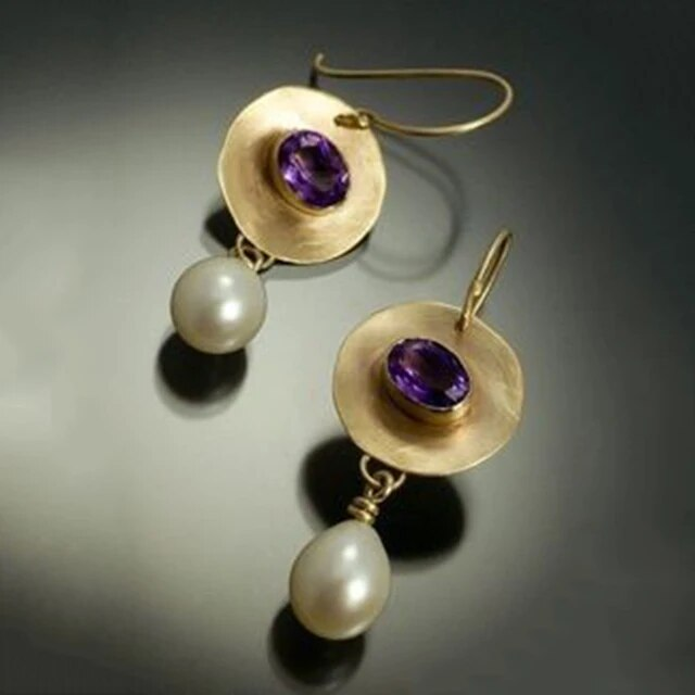 Purple gold earrings with antique pearls