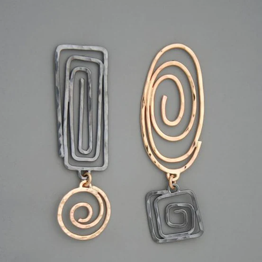 Gold and silver spiral earrings in vintage style