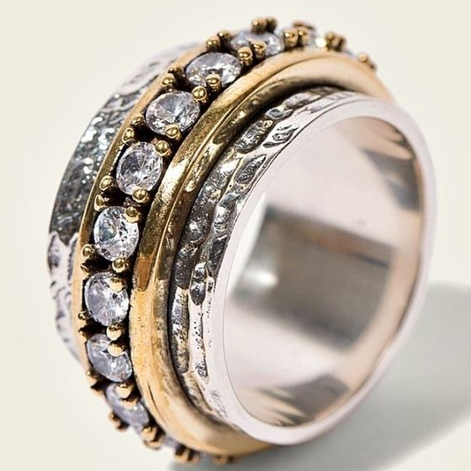 Vintage-style ring with gold and silver and cubic zirconia