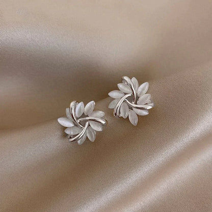 Elegant gold and silver nut earrings