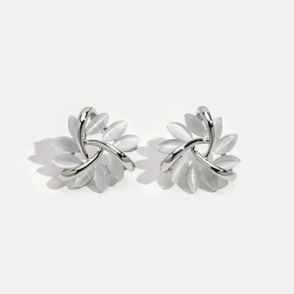 Elegant gold and silver nut earrings