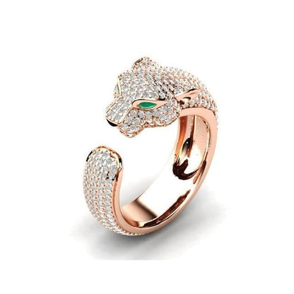 18-carat silver and 18-carat rose gold adjustable Jaguar ring with green cubic zirconia eyes