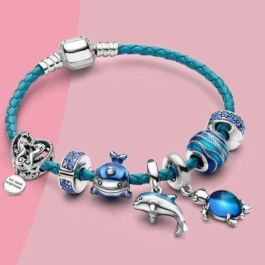 Ocean-style bracelet with leather and silver charms